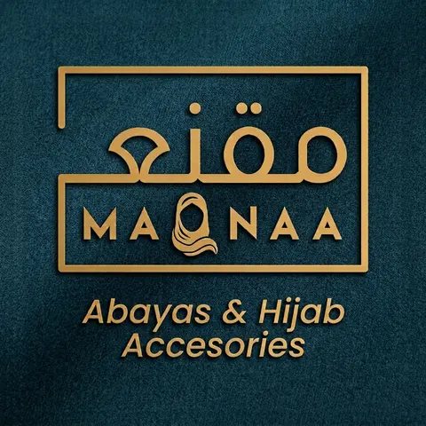 The Maqnaa brand mark on its deep-teal suede backdrop
